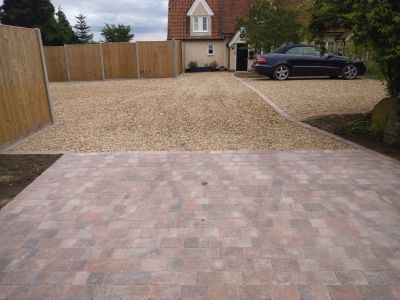 Driveway with shingle and paved area