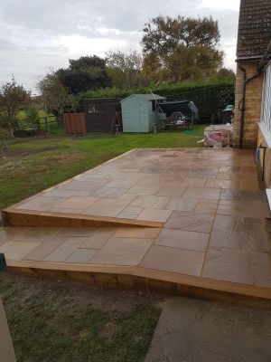 Tiled wheelchair-accessible patio with slope